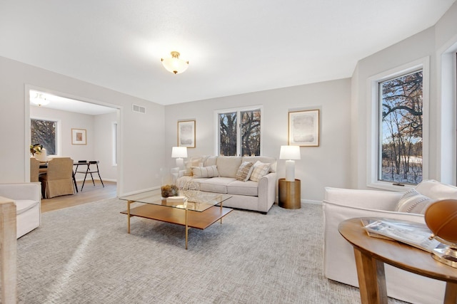 living room with a healthy amount of sunlight