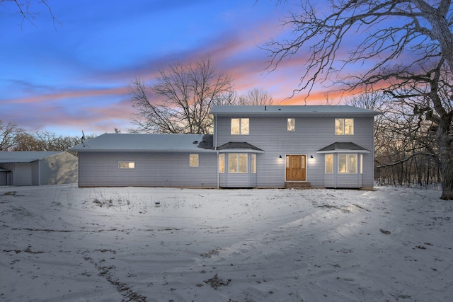 view of snow covered property