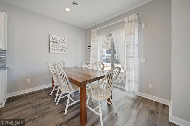 dining room featuring dark hardwood / wood-style floors