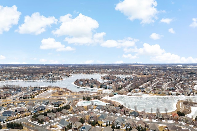 aerial view with a residential view and a water view