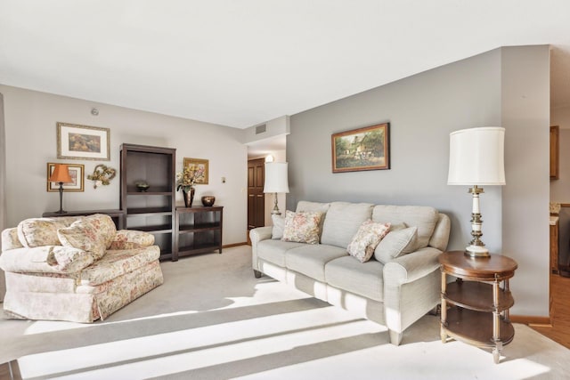 living room with light carpet