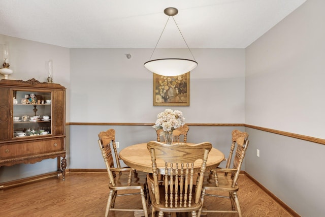 dining area featuring hardwood / wood-style flooring