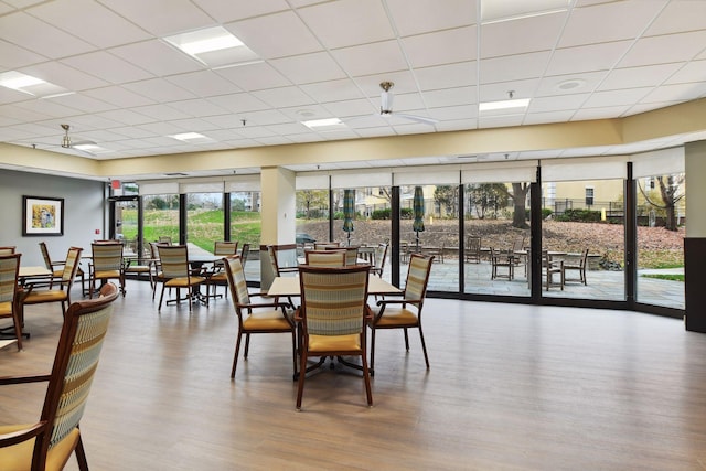6615 Lake Shore Dr S Unit 403, Richfield, MN 55423 - dining room with wood finished floors and a paneled ceiling