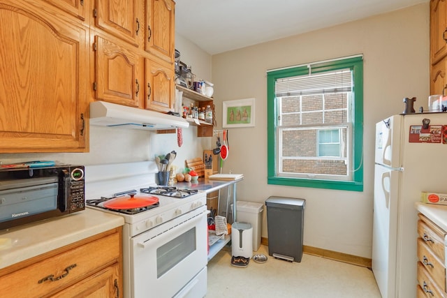 kitchen featuring white appliances