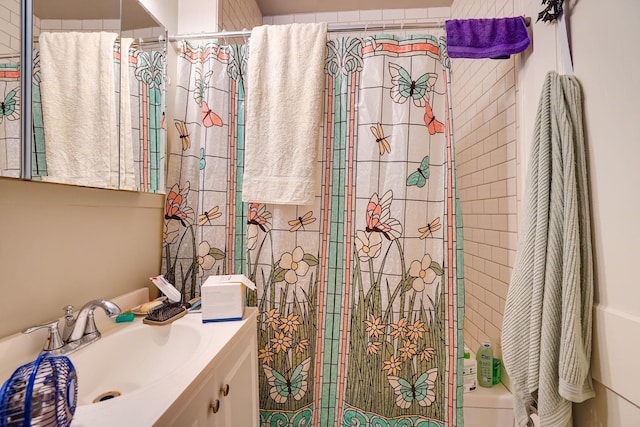 bathroom featuring vanity and walk in shower