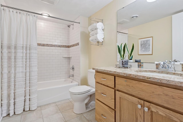 bathroom featuring tile patterned floors, shower / bath combo with shower curtain, toilet, and vanity