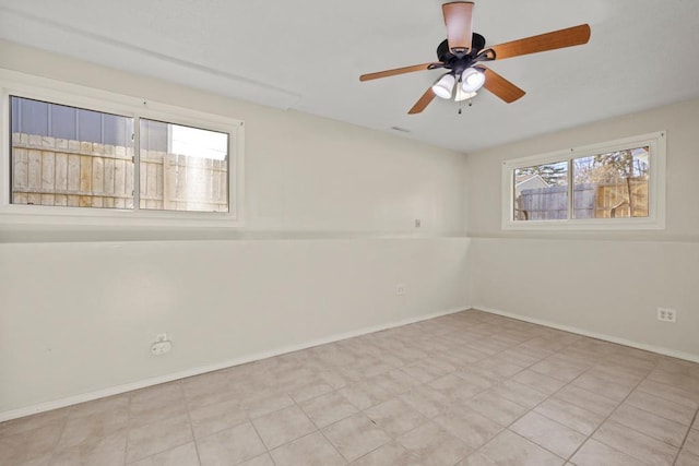 unfurnished room featuring ceiling fan