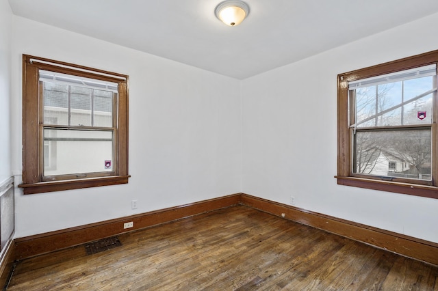 3431 Irving Ave N, Minneapolis, MN 55412 - spare room with wood finished floors and baseboards