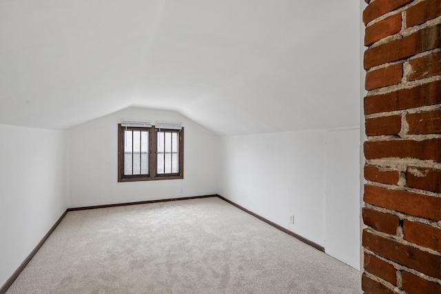 3431 Irving Ave N, Minneapolis, MN 55412 - additional living space featuring carpet and vaulted ceiling