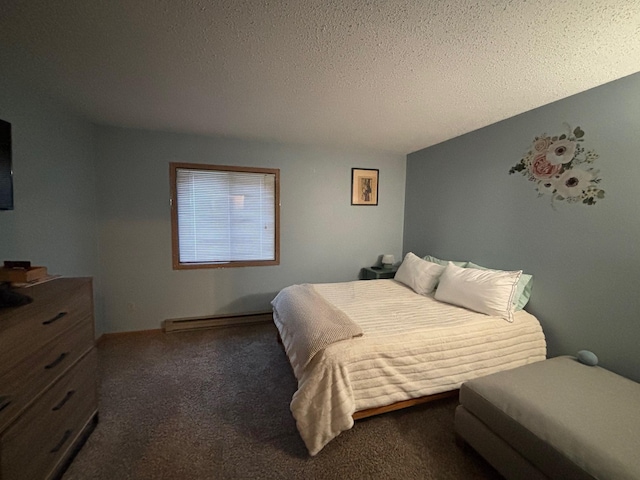 bedroom featuring dark colored carpet, a textured ceiling, and baseboard heating