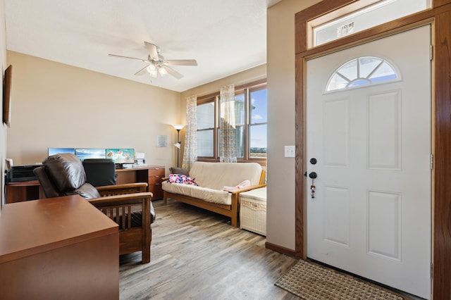 entrance foyer featuring ceiling fan and light wood-type flooring