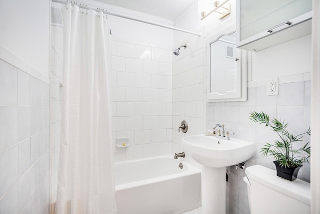 4415 Snelling Ave, Minneapolis, MN 55406 - full bathroom with tile walls, shower / bath combination with curtain, and backsplash