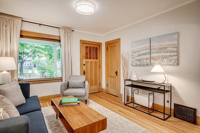 4415 Snelling Ave, Minneapolis, MN 55406 - living room featuring crown molding and wood finished floors