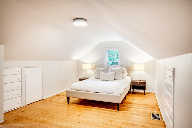 4415 Snelling Ave, Minneapolis, MN 55406 - bedroom with light wood finished floors and lofted ceiling