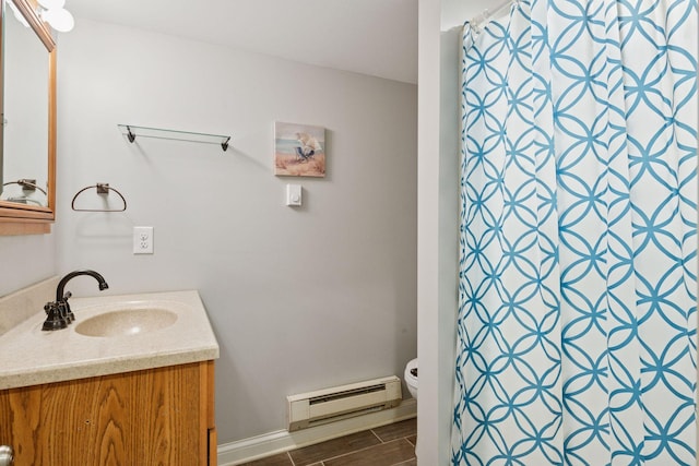 full bathroom with a baseboard heating unit, wood finish floors, toilet, a shower with curtain, and vanity