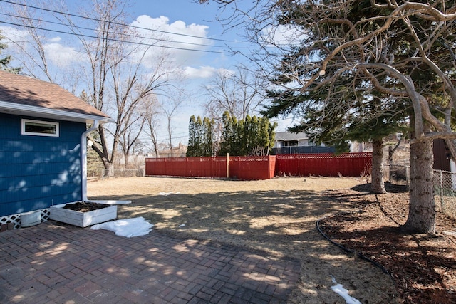 view of yard with a patio area and fence