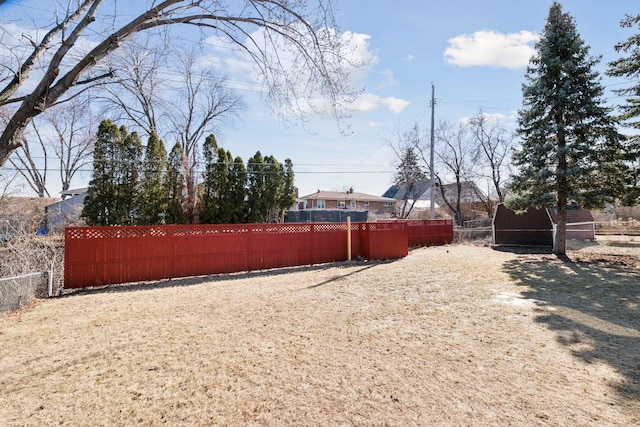 view of yard featuring fence