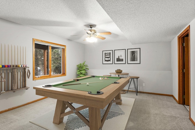 playroom with ceiling fan, light colored carpet, a textured ceiling, and billiards