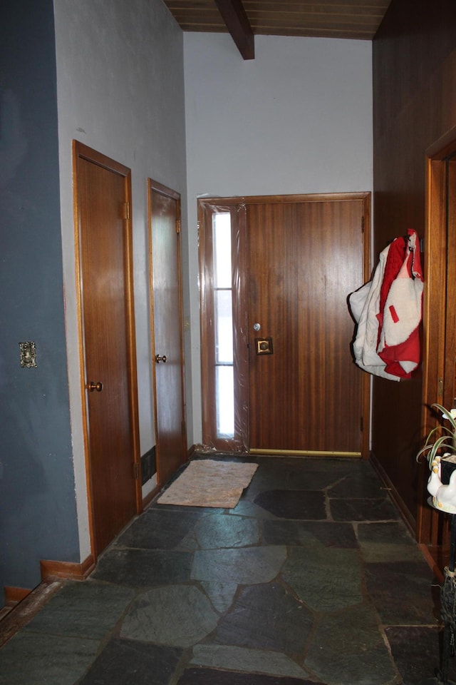 entrance foyer with beamed ceiling