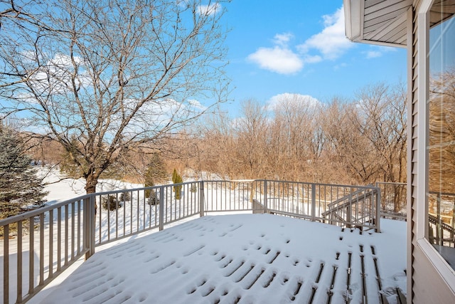 view of snow covered deck