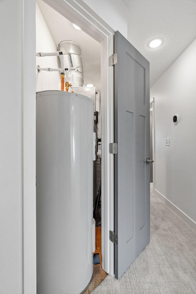 utility room with water heater