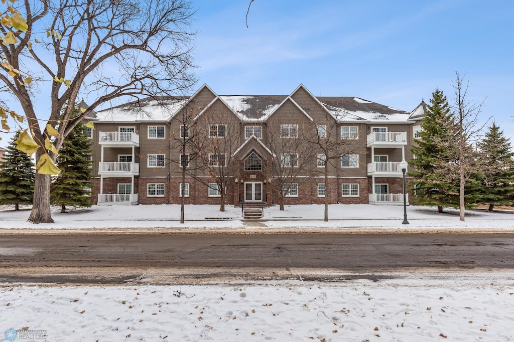 view of snow covered property