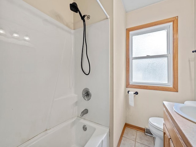 full bathroom featuring toilet, tub / shower combination, vanity, baseboards, and tile patterned floors