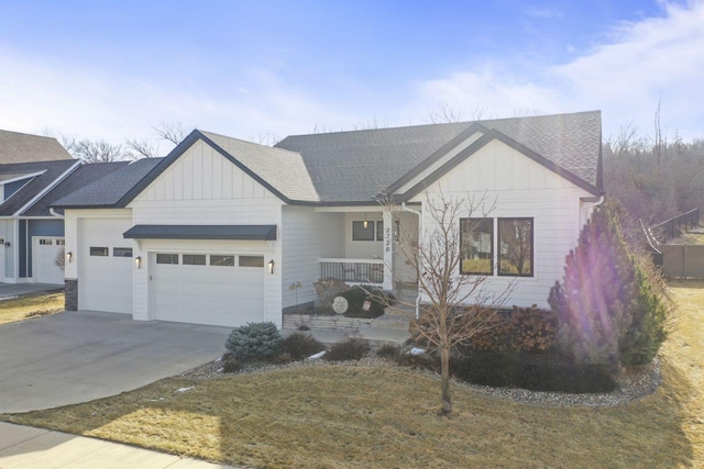 view of front of house featuring a garage and covered porch