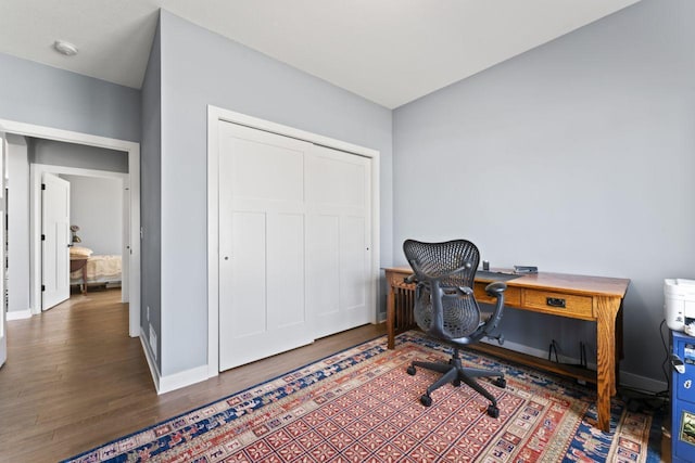 office space with hardwood / wood-style floors