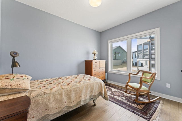 bedroom featuring light wood-type flooring