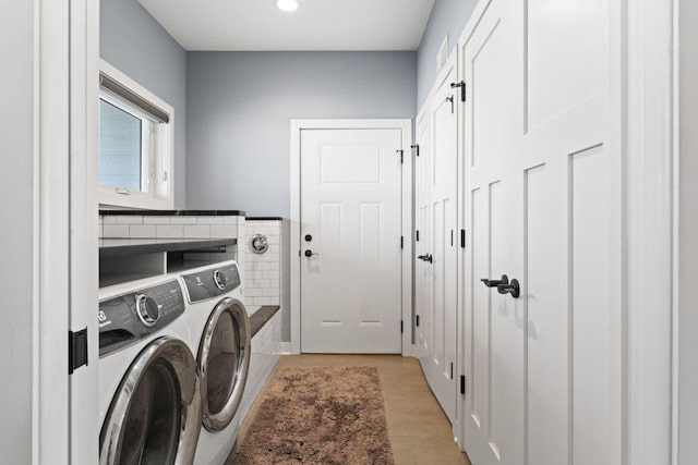 laundry area featuring independent washer and dryer