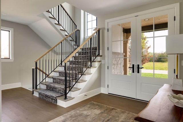 entryway featuring french doors and dark hardwood / wood-style floors