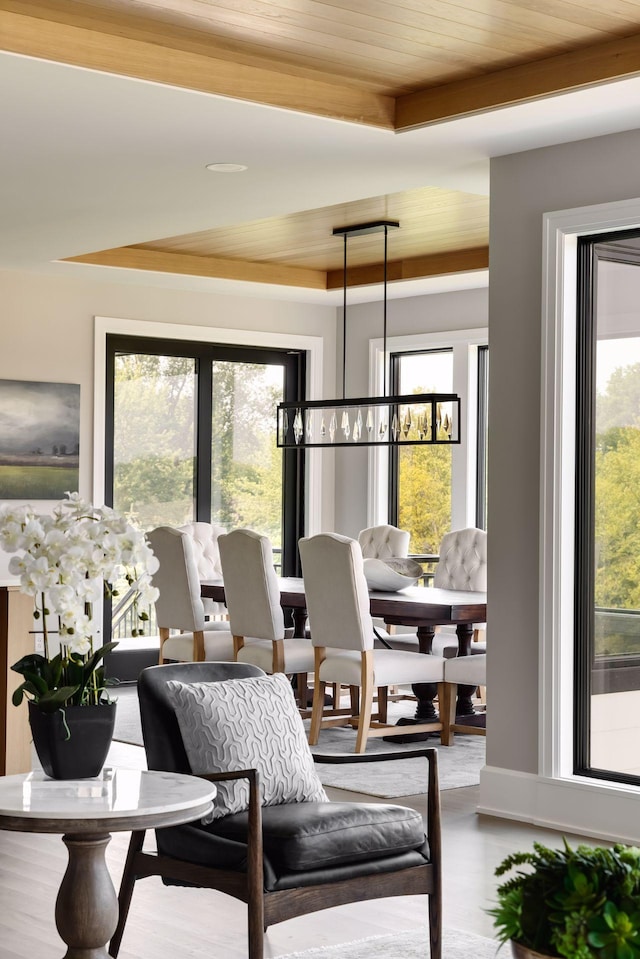 interior space featuring wooden ceiling and a chandelier