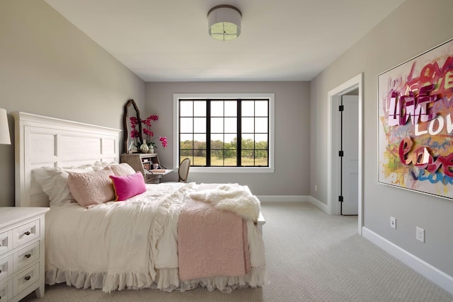 bedroom with light carpet