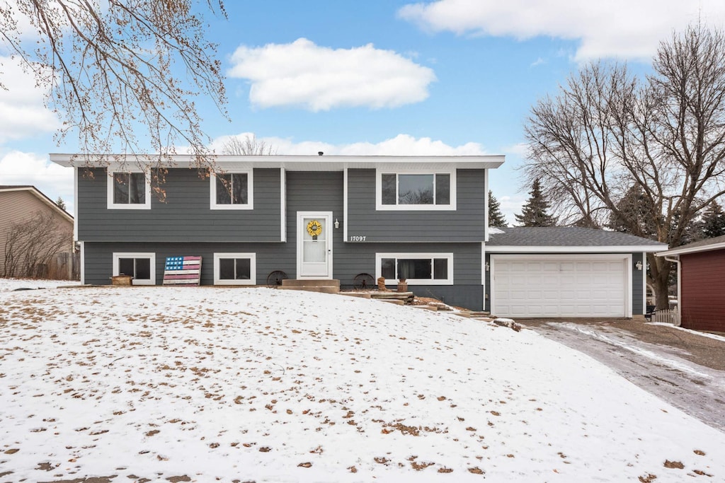 bi-level home featuring a garage