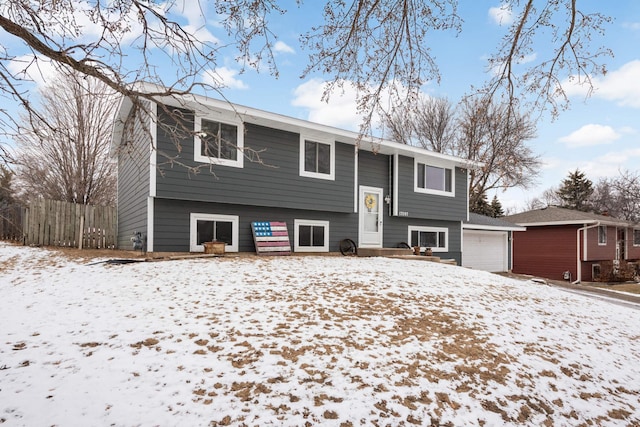 bi-level home featuring a garage