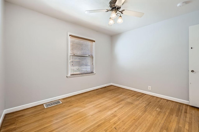 spare room with ceiling fan and light hardwood / wood-style flooring