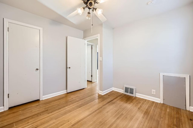 unfurnished bedroom featuring ceiling fan and light hardwood / wood-style flooring