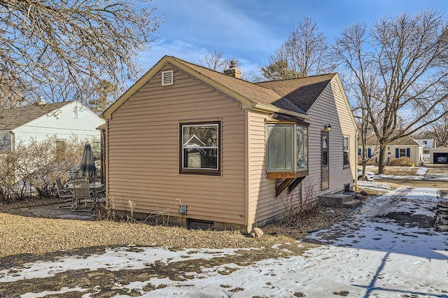 view of snow covered property