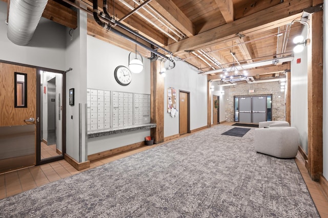 basement featuring wooden ceiling, mail boxes, and light tile patterned floors