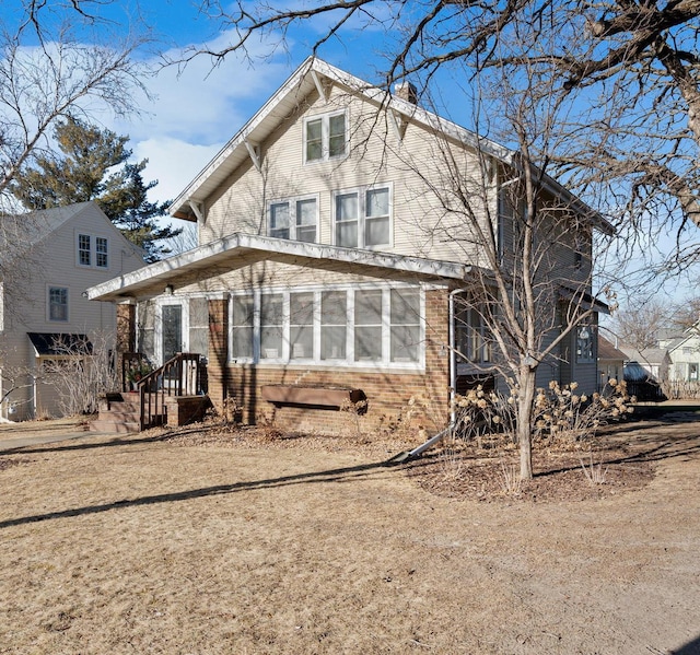 view of front of property with brick siding