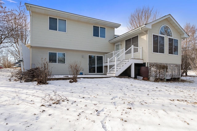 view of snow covered house