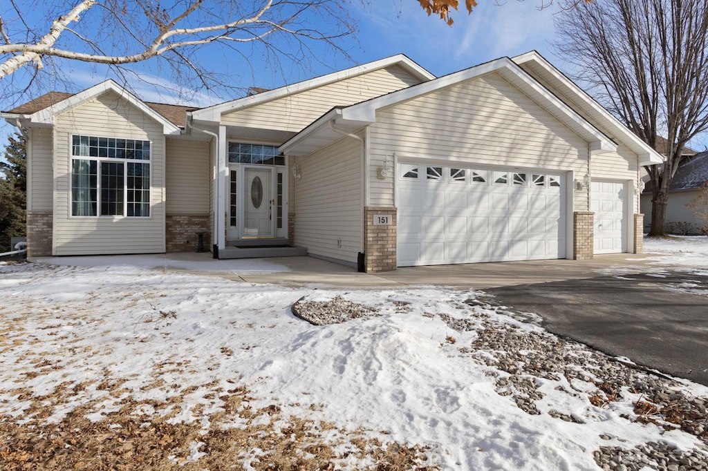 single story home with a garage