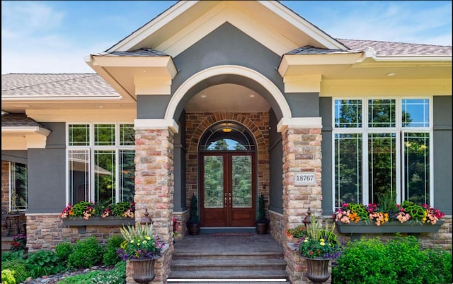 entrance to property featuring french doors