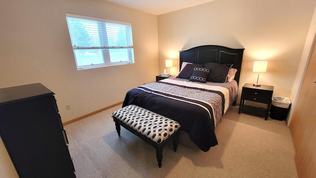 bedroom with light carpet