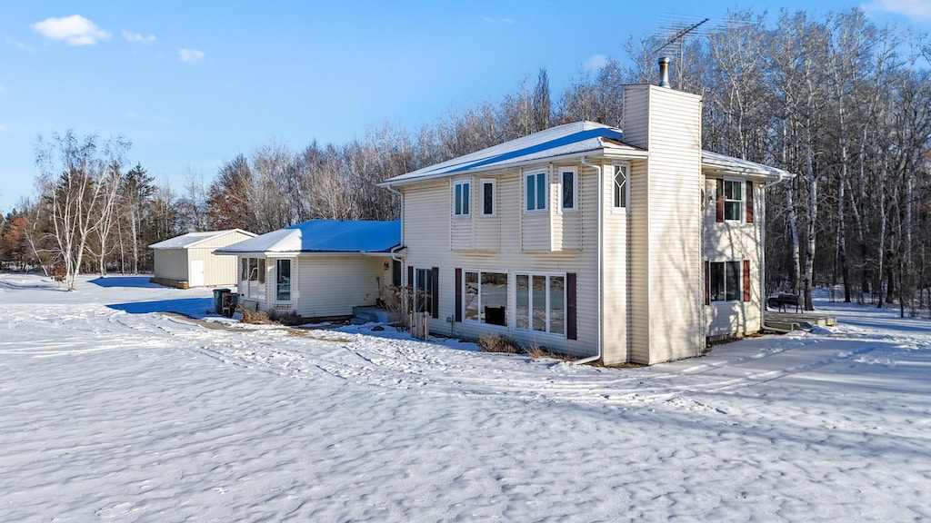 view of snow covered property