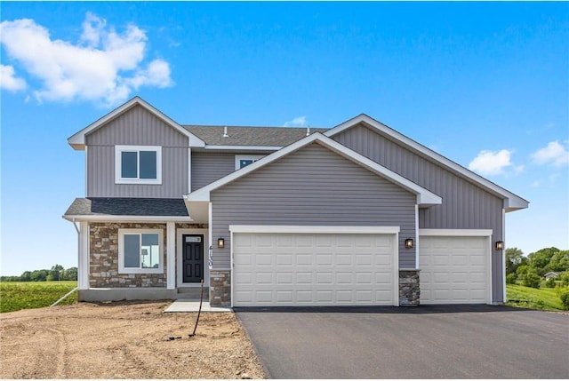 craftsman-style house featuring a garage