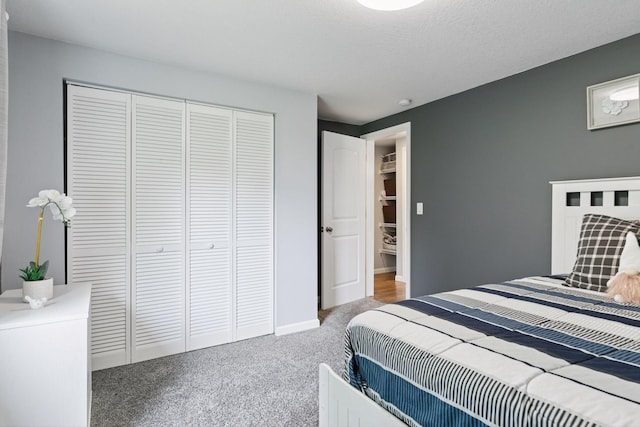 1524 Mulberry St, Taylors Falls, MN 55084 - bedroom featuring carpet floors, a closet, and baseboards
