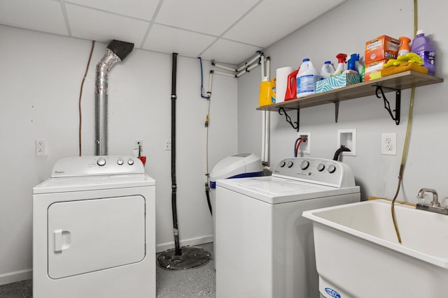 1524 Mulberry St, Taylors Falls, MN 55084 - washroom with washer and clothes dryer and baseboards