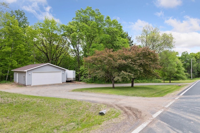 1524 Mulberry St, Taylors Falls, MN 55084 - view of front of property with a detached garage, an outdoor structure, and a front lawn